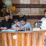 Helping me out with HH sign, Khonesavang GH, Luang Prabang